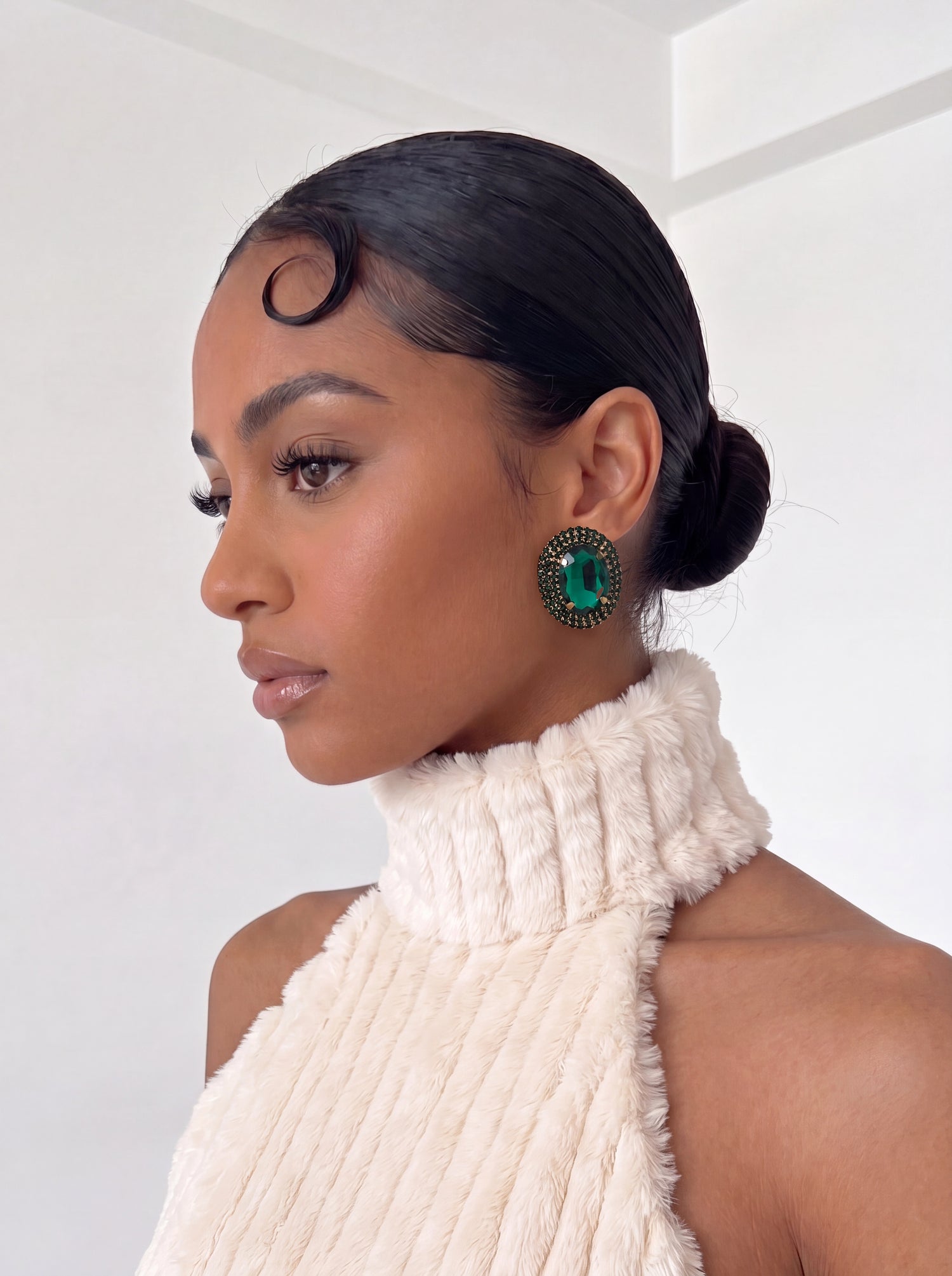 Designed to command attention, these vintage-inspired statement studs combine rich jewel tones with intricate crystal detailing for an effortlessly elegant finish.